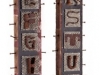 Twenty-Six Rusty Letters on Two Old Posts, 2010